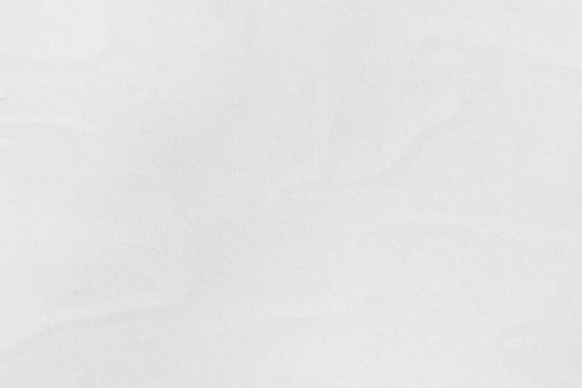Texture of white crumpled paper background