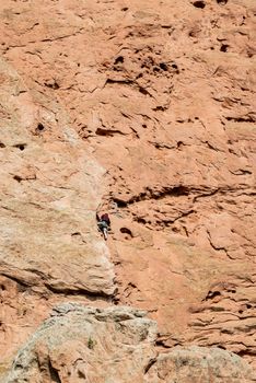 Rock-climber along Central Garden Trail in Garden of the Gods, Colorado