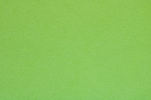 Texture of light green sponge, abstract background