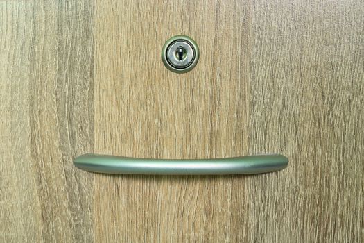 Brown wooden cabinet drawer with one keyhole