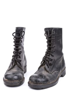 Pair of Black Dirty army boots isolated on white background