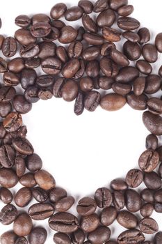 Heart shape coffee beans isolated on white background
