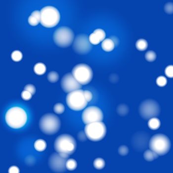 Abstract white bokeh effect on blue background