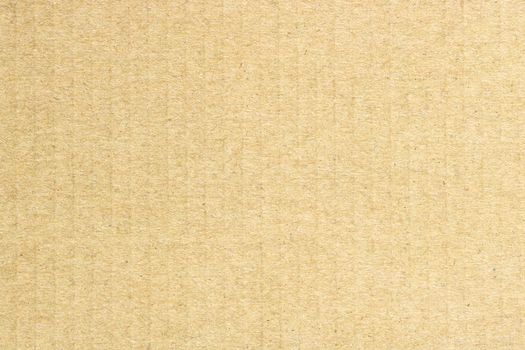 Texture of  brown cardboard, vertical stripes, abstract background