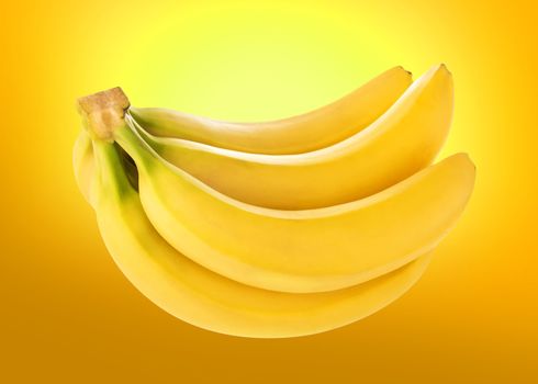 Banana is isolated on a yellow background