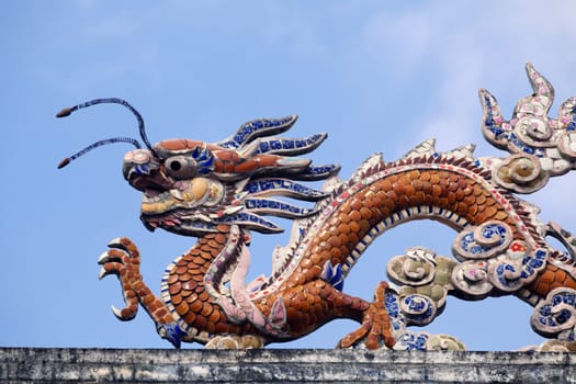 Dragon on a roof of a Vietnamese temple