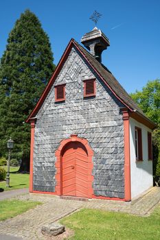 Small old chapel in Odenthal, typical village of the Bergisches Land, Germany