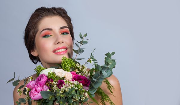 Beautiful woman with bouquet of flowers gift for valentines day