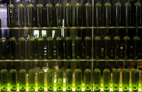 Empty wine bottles, detail of decorative glass bottle