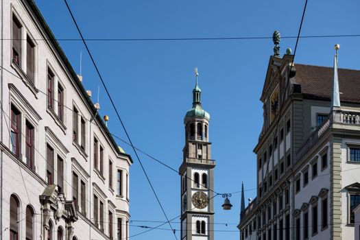 View to tower of St. Peter and townhall with blue sky in city Augsburg, Bavaria, Germany