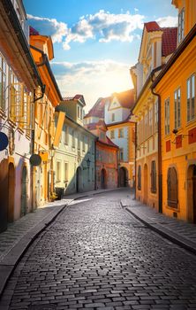 Old narrow street of Prague at dawn