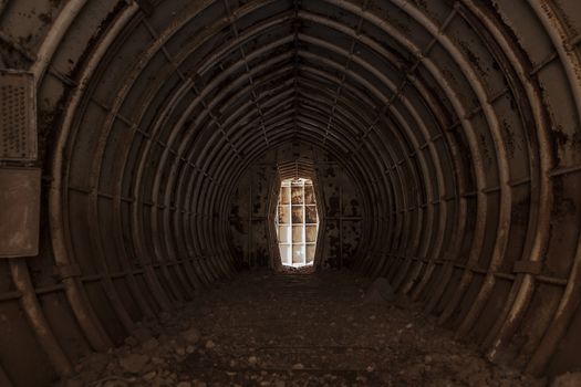 Rusted underground bunker passage tunnel