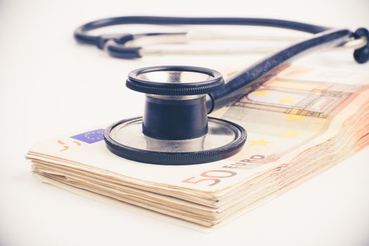 Euro banknote pile with black stethoscope inked style image