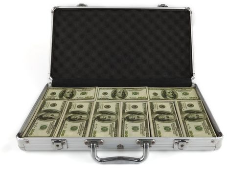 briefcase full with dollar banknotes isolated on white background