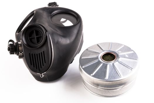 Black gas mask close-up with filter  isolated on white background
