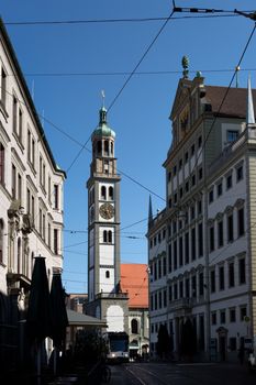 View to tower of St. Peter and townhall with blue sky in city Augsburg, Bavaria, Germany