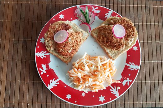 Christmas decoration. Festive plate with low carb food and christmas decoration. Christmas background