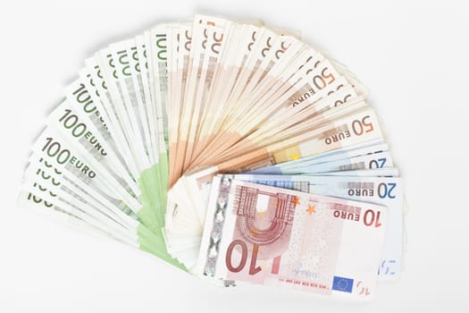 Different euro banknotes on white background