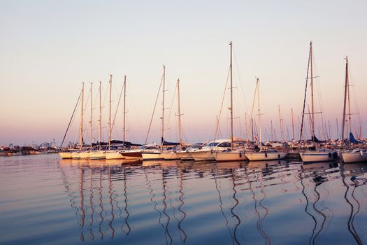 Marina with docked yachts at sunset in Giulianova, Italy