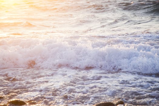 beautiful sea waves at sunset -  beach holiday background