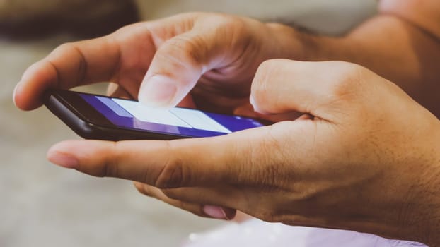 Phone on hands.