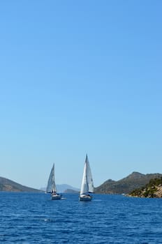 Sailing luxury boats participate in sail yacht regatta in the Aegean Sea in Turkey