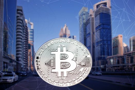 bitcoin against skyscrapers - futuristic smart city - cryptocurrency concept