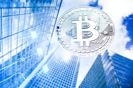 bitcoin agains skyscrapers - futuristic smart city - cryptocurrency concept