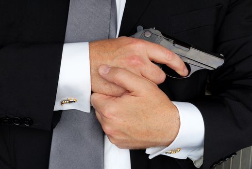 The businessman with the gun, as allegory of rigid competitiveness
