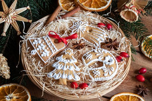 Christmas gingerbread cookies in a wicker basket on a table