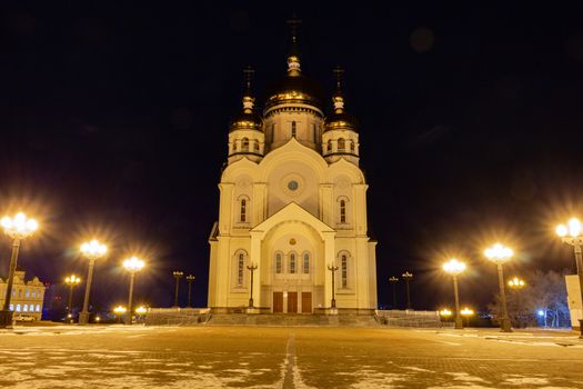 The Cathedral is illuminated by lamps at night.