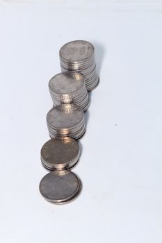 Stock pile 2 two Indian rupee metal coin currency on isolated white background. Financial, economy, investment growth concept. Banking and exchange object. closeup.