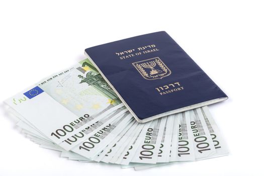 Israeli passport with 100 euro banknotes isolated on white background