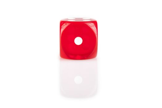 One  red dice isolated on white background with reflection