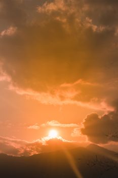 Gorgeous panorama scenic beauty of the sunset with colorful clouds on orange sky. Heavenly Sky background on Sunset and sunrise. Nature composition.