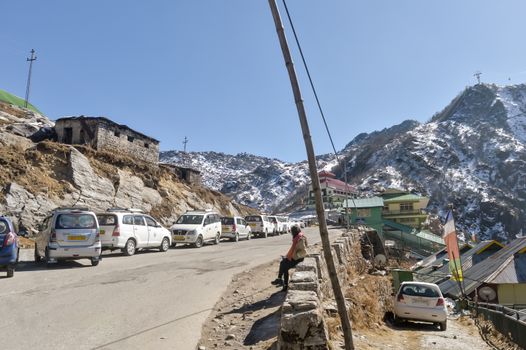 Nathula Pass, Gangtok, Sikkim, 1st Jan 2019: Tourist car parked in line near road of Nathu La Chinese mountain pass in Himalayas in East Sikkim. It connects Indian state Sikkim with China Tibet Region