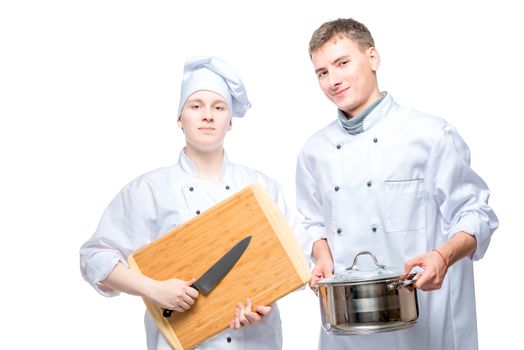 professional chefs with kitchen utensils on a white background