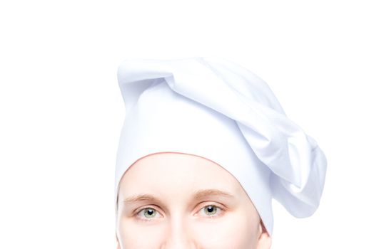 female chef's eyes with hat close up on white background