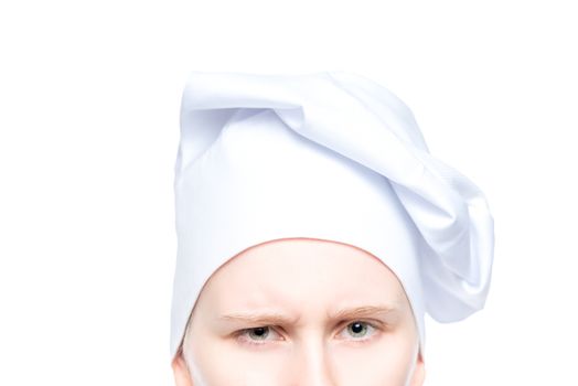 stern look cook in hat close up on white background