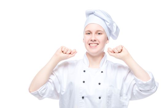 successful chef in suit rejoices in victory, emotional portrait on white background