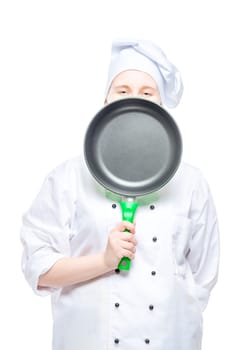 cook peeking from behind the frying pan, studio shot on white