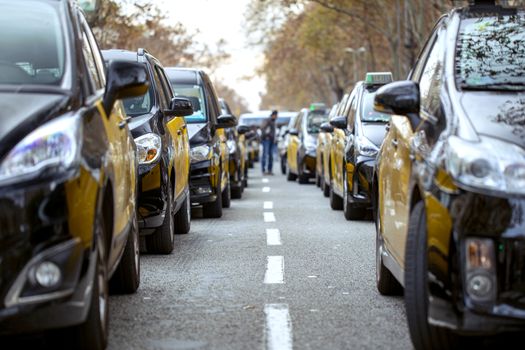 Taxi drivers strike in Barcelona. The main street of the city, blocked by taxi cars.