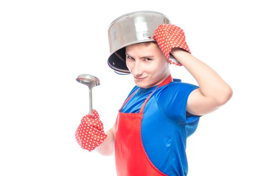 crazy man in an apron with a pan on his head posing on a white background