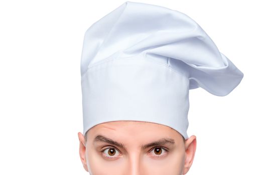 look cook in a cap, eyes close up, portrait isolated on white background