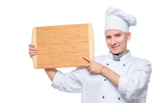 horizontal portrait of an experienced chef with a cutting board on a white background