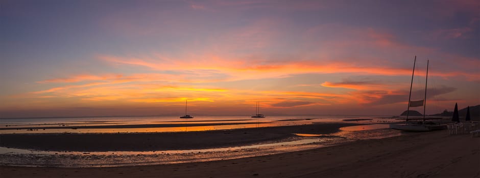 Colorful panorama sky during sunset in the twighligth sky over sea at seashore