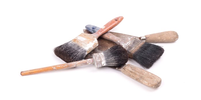 Collection of old paintbrushes, isolated on white