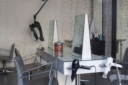 Barber shop salon with seats and mirrors