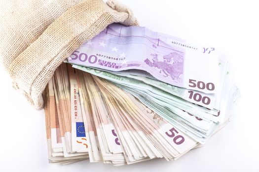 A bag full with euro banknotes isolated on white background