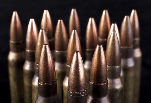 Bullets closeup on black backgrounds 